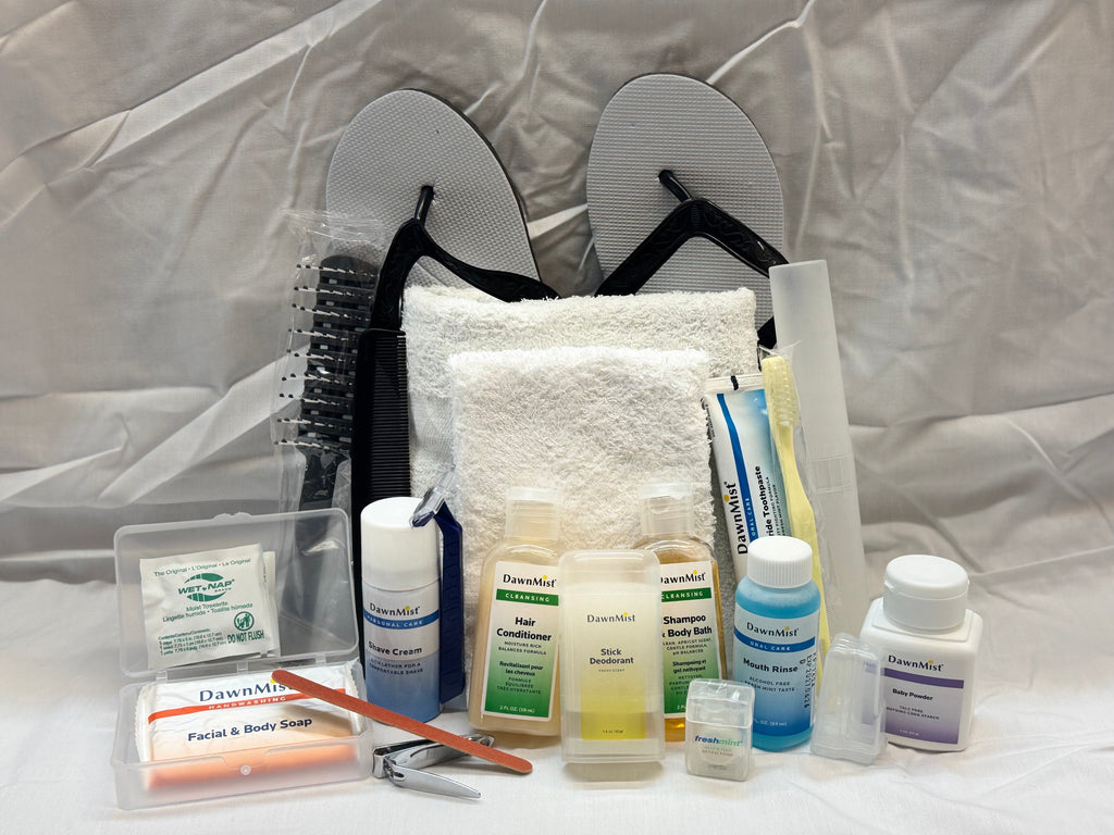 Collection of toiletries and personal care items on a white surface with a white background