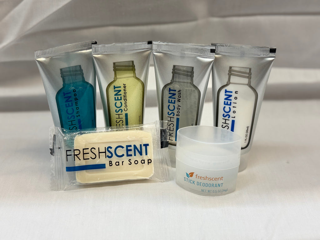 Collection of FreshScent toiletries including bar soap, bottles, and stick deodorant on a white background.